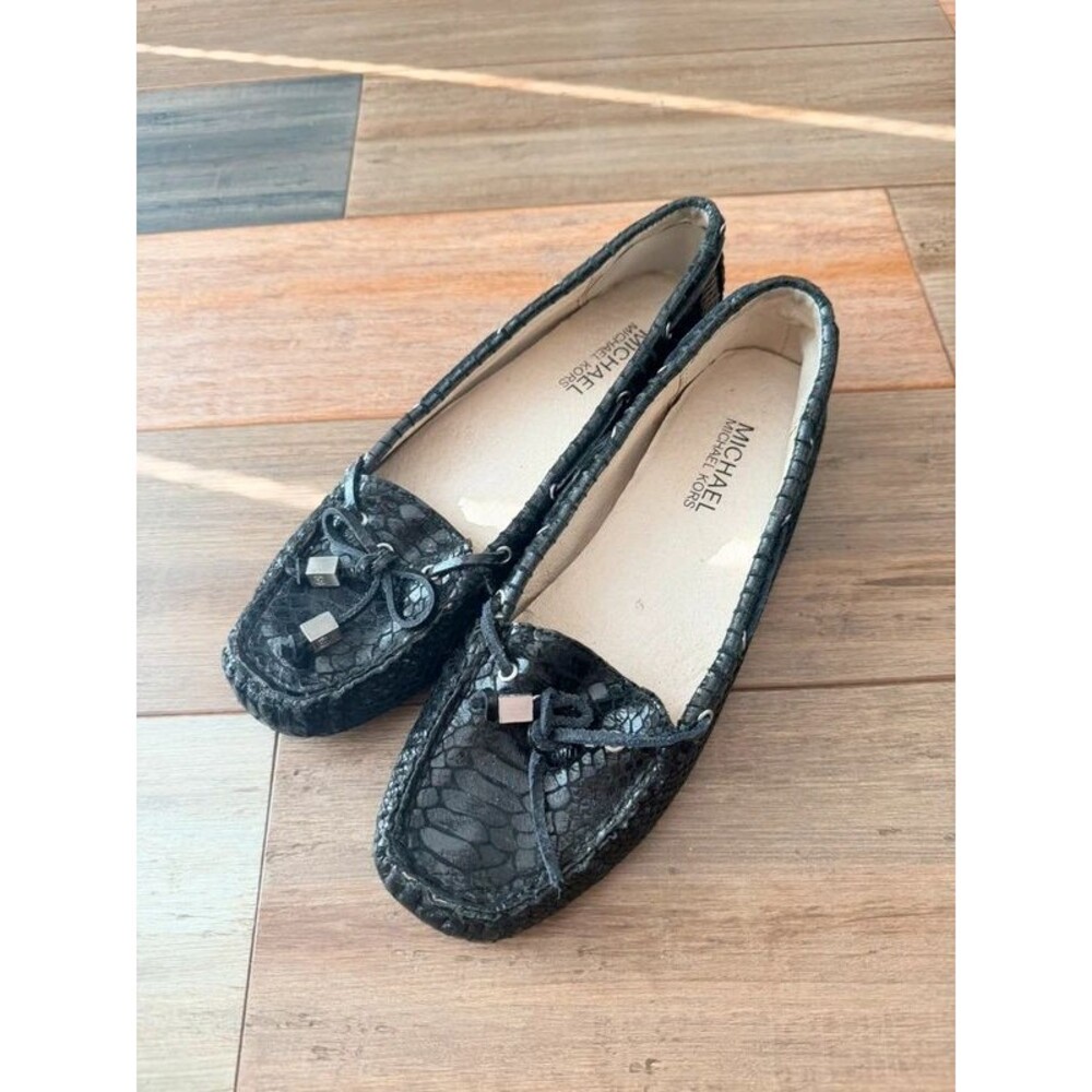 Michael Kors black snake-embossed leather moccasin flats, size 6.5